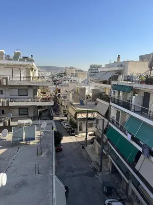 an aerial view of a city with buildings at Piraeus Seaside Apartment Escape in Piraeus