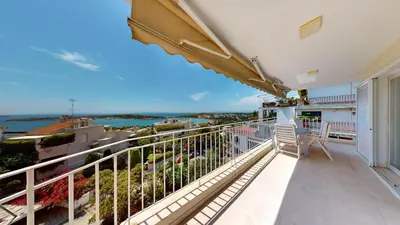 a balcony with a view of the ocean at Raise Riviera Panoramic Sea View apartment in Athens
