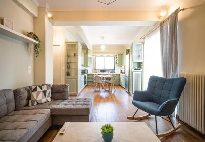 a living room with a couch and a table at ΜΚ Αpartment 2ΥΔ - Nikea Metro in Piraeus