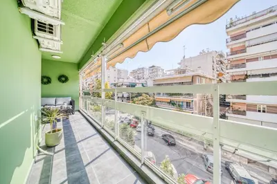 a balcony with a view of a city at Athens Riviera, seaview, beachfront, Lux Apartment on Starbucks building in Athens