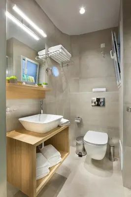 a bathroom with a sink and a toilet at Jason Inn in Athens