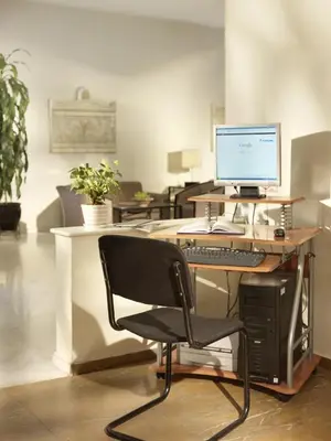 an office with a desk with a computer and a chair at Jason Inn in Athens