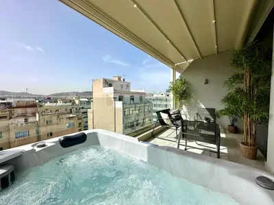 a bath tub sitting on top of a building at BlueMotion - CruiseNest 6Α in Piraeus