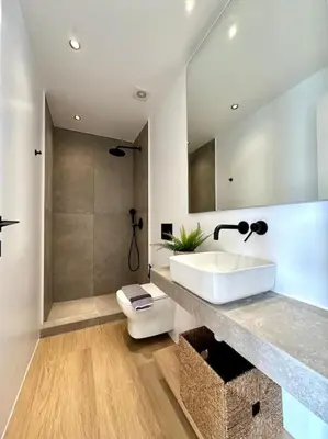a bathroom with a sink and a toilet and a shower at BlueMotion - CruiseNest 6Α in Piraeus