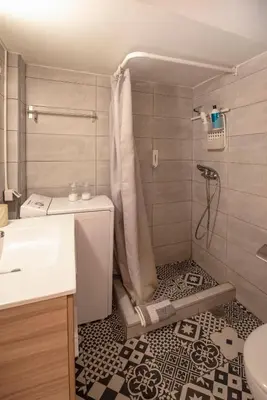 a bathroom with a shower and a sink at Alkisti in Athens