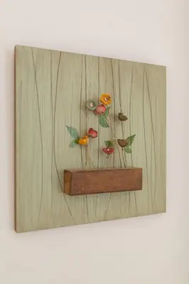 a painting of flowers on a wooden wall at Olvios Attiki Metro in Athens