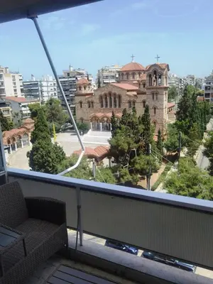 a view of a building from a balcony at 110 Sqm 2BD Edem beach luxury apartment in Athens