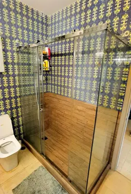 a shower stall with a toilet in a bathroom at 110 Sqm 2BD Edem beach luxury apartment in Athens
