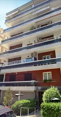 an apartment building with a balcony on the side of it at 110 Sqm 2BD Edem beach luxury apartment in Athens