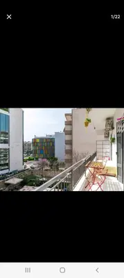 a collage of two pictures of buildings and a balcony at Dreaming of Greece G1 in Athens