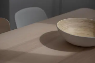 a white bowl sitting on top of a table at Bright & Cozy House near Beach in Athens