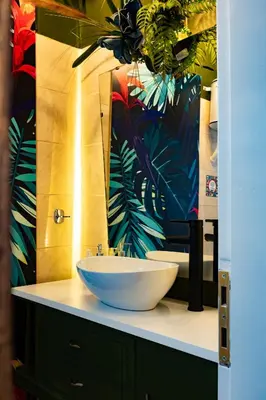 a bathroom with a sink and a large mirror at Athenian Urban Art Apartment - Live Athenian Life in Athens