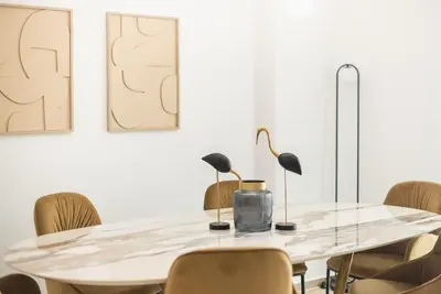 a dining room with a table and chairs at Acropolis Diamond in Athens