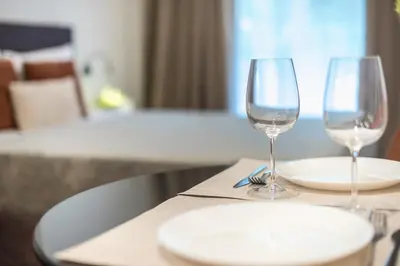 two wine glasses sitting on top of a table at Athens Home in Athens