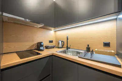 a kitchen with a sink and a counter top at Athens Home in Athens