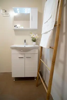 a bathroom with a sink and a bunk bed at Ancient Agora Plaka in Athens