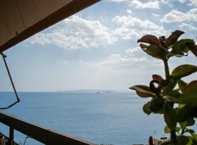 a view of the ocean from a balcony at Above the Sea in Piraeus