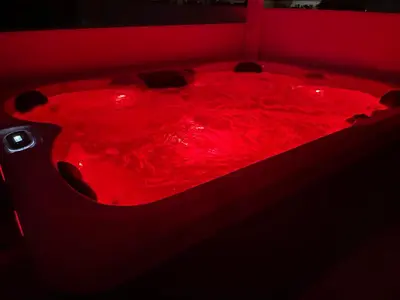a red bath tub filled with red liquid at Glyf Seaview Penthouse by Taurus in Athens