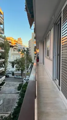 a hallway of a building with a view of a parking lot at Stylish Apt in Paleo Faliro 300m from the beach in Athens