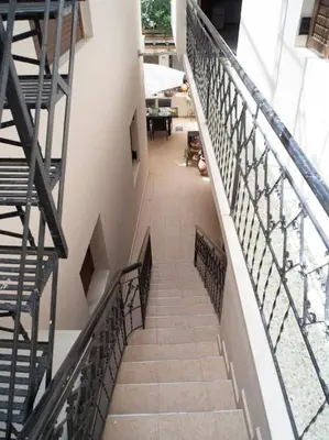 a view of a staircase in a building at Athens Hill of Harmony in Athens