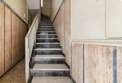 a stairway in a building with a stair case at RolandApartaments in Athens