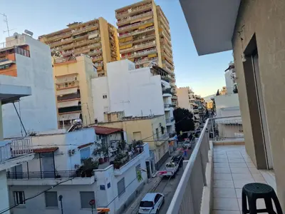 a view from a balcony of a city with buildings at RolandApartaments in Athens