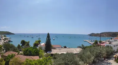 a view of a harbor with boats in the water at Anatoli Hotel in Agia Marina Aegina