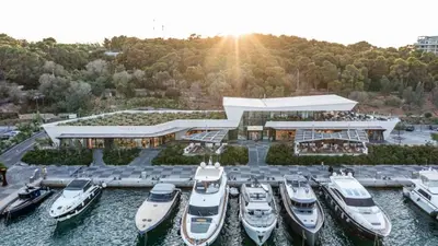 a group of boats are parked in a marina at Emerald Stone Apartment Varkiza in Vari