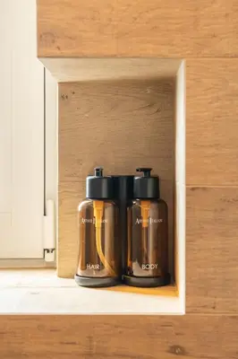 two coffee pots are sitting in a wooden box at RoofTop Sea View Cabin in Vari