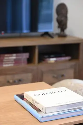 a book sitting on top of a table at Stylish and spacious apartment in cool area in Athens