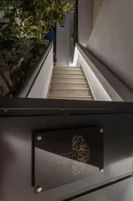a set of stairs with plants on the side at Perth Luxury Living, Athens in Athens