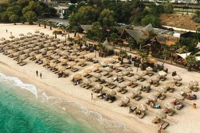 an aerial view of a beach with umbrellas at Astric Seaview Penthouse in Athens