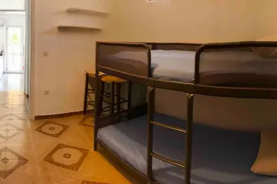 a group of bunk beds in a room at Fysis Panorama spectacular view in Porto Rafti