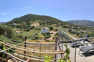 a set of stairs with a view of a mountain at Fysis Panorama spectacular view in Porto Rafti
