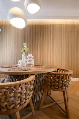 a dining room with a table and two chairs at Glyfada Platinum Résidence in Athens