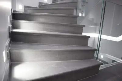 a set of concrete stairs in a room at Golden Sand Suites in Anavissos