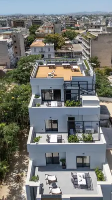 an aerial view of a white apartment building at The Meta Stay - Rooftop Access 1 bedroom suite in Athens