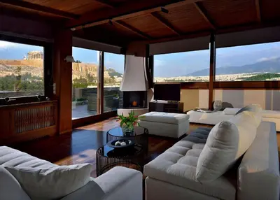 a living room with white furniture and large windows at Outstanding Athens Apartment Karyatis Luxury Maisonette 3 Bedrooms in Athens