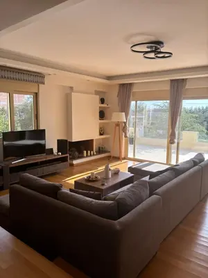 a living room with a couch and a piano at Luxury Villa with Pool in Athens Riviera in Lagonissi