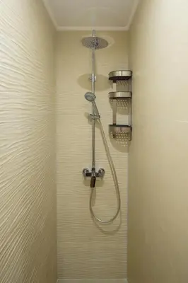 a shower with a shower head in a bathroom at Charming apartment Galatsi for 5 by MPS in Athens