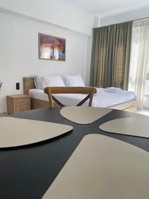 a room with a table with a pair of scissors on it at Syntagma Luxury Suite by CK-1 in Athens