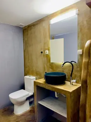a bathroom with a sink and a toilet at Villa Anastasia in Athens