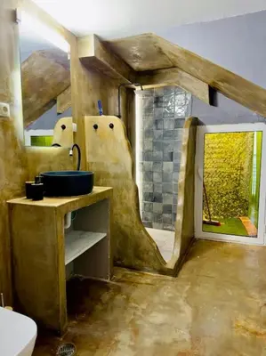 an unfinished bathroom with a sink and a window at Villa Anastasia in Athens
