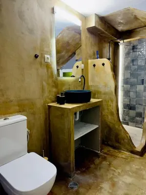 a bathroom with a toilet and a sink at Villa Anastasia in Athens