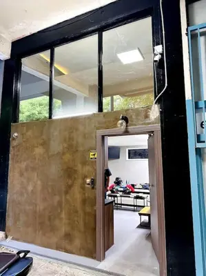 an open door of a house with a person in the background at Villa Anastasia in Athens