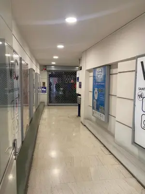 a hallway of a store with a door and ailed floor at Syntagma Luxury Suites by CK-3 in Athens