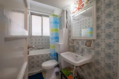 a bathroom with a toilet and a sink at Very comfortable, close to Acropolis in Athens
