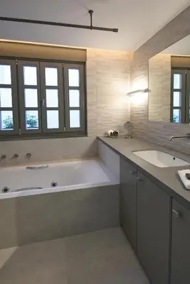 a large bathroom with a large tub and two sinks at En Plaka - Athens Elegant Estate in Athens