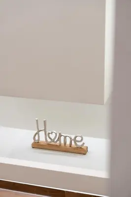 a shelf with a pair of scissors on a wall at Vitsas House By Greece Apartments in Athens