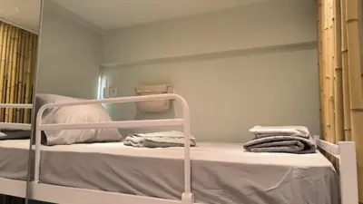 a bunk bed with towels on it in a room at EstelZan Studio in Athens